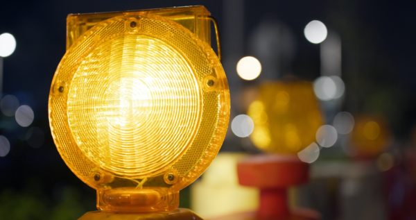 Yellow caution light at street
